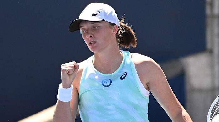 Aug 10, 2022; North York, ON, Canada; Iga Swiatek (POL) reacts after winning a point against Anja Tomljanovic (AUS) (not pictured) at Sobeys Stadium.